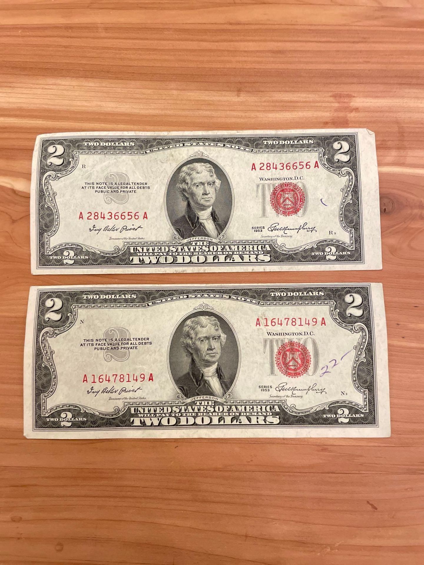 (2) 1953 $ Red Seal Notes (Note with cutting error)