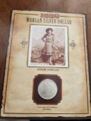 1886 Uncirculated Morgan Dollar with Annie Oakley Stamp and Facts