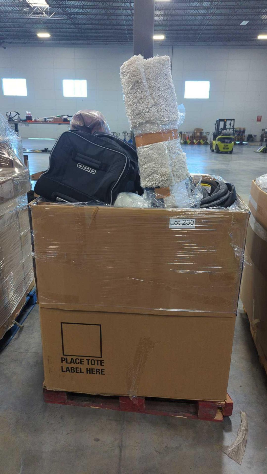 pallet of rugs ogo duffel bag Britax car seat and more