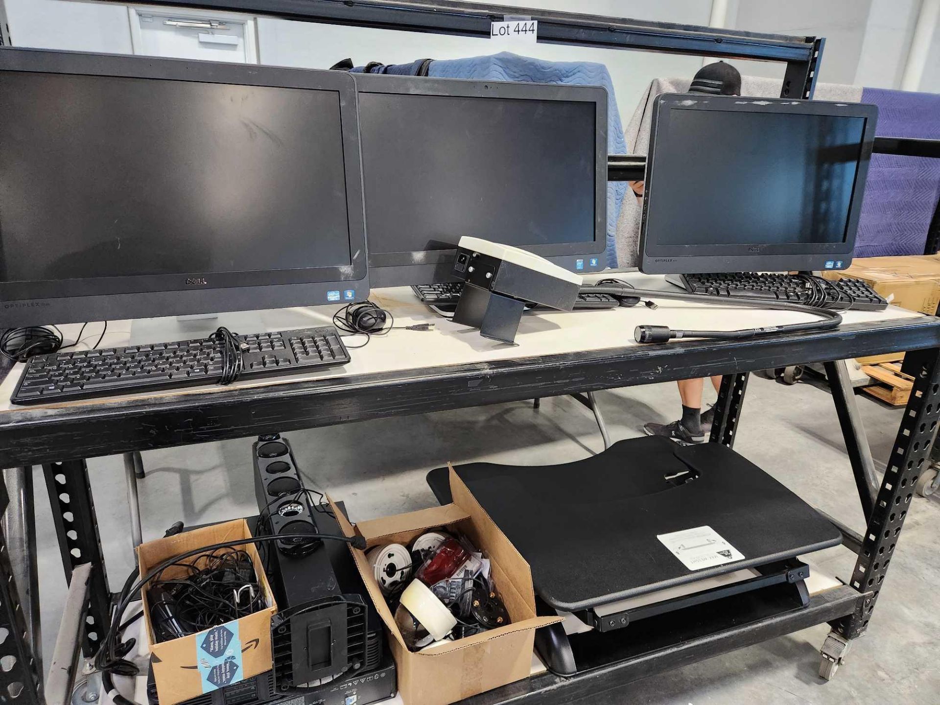 rolling rack of computers and accessories