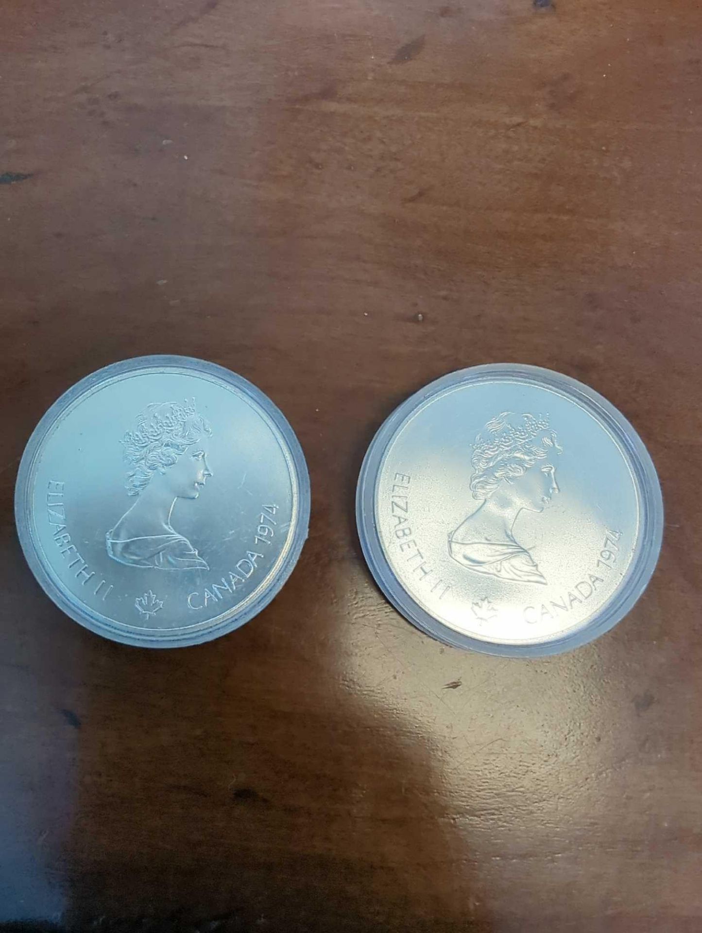 2 1974 Queen Elizabeth Olympics Silver 5 dollar coins
