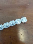 14KT White gold and diamond bracelet with OC Tanner appraisal