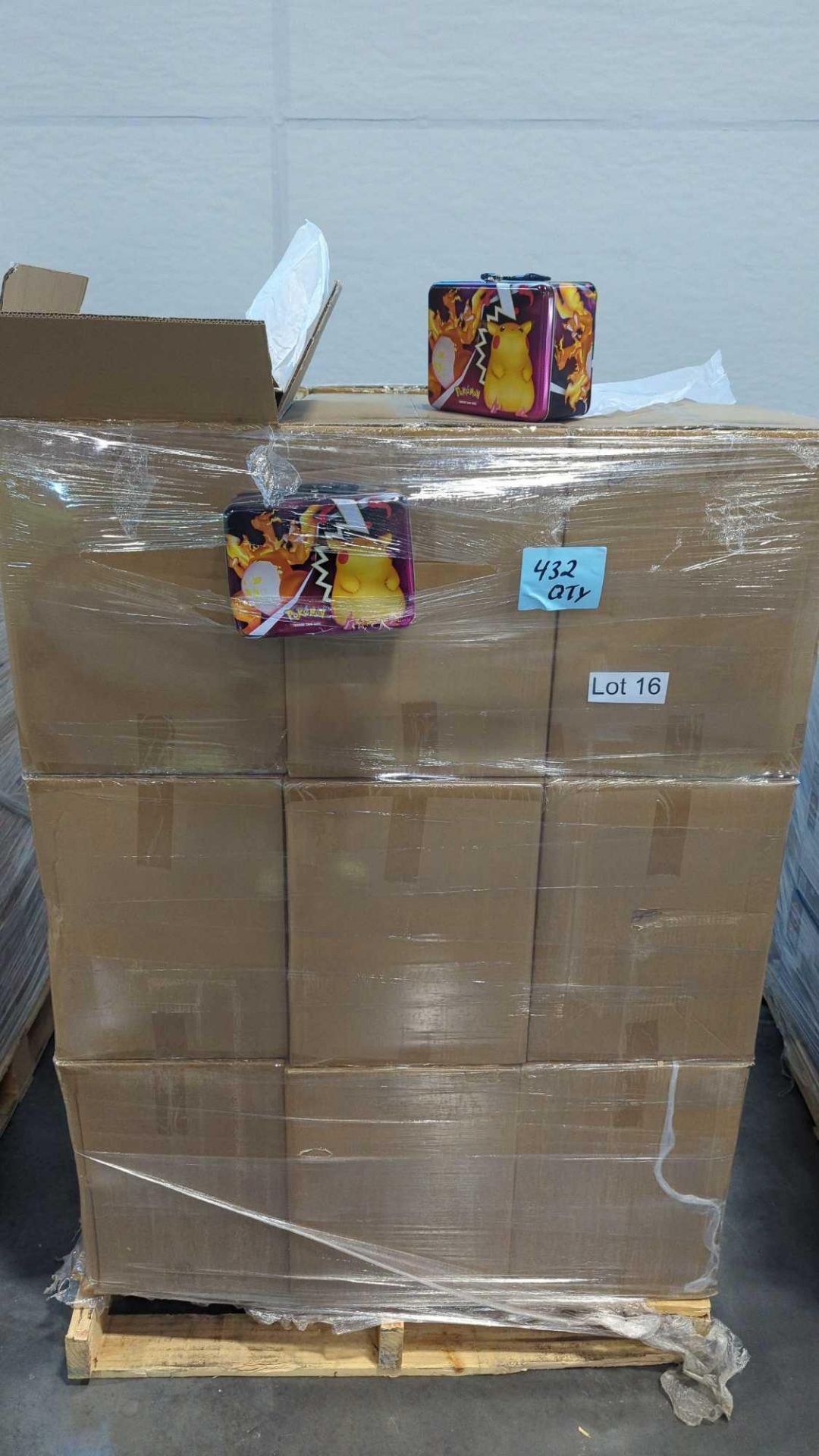 (1) pallet - multiple boxes of pokemon card tins