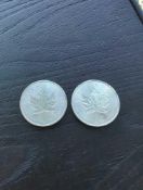 2 Canadian Maple leaf silver coins