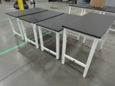 (4) Heavy duty resin top tables (adjustable)