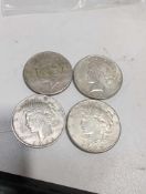 Four Silver Peace Dollars: 1922, 1922, 1923, 1923