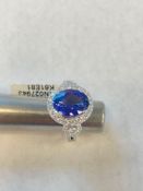 18 karat tanzanite and diamond ring four carat tanzanite 0.92 carat diamond