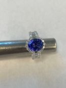 18 karat white gold diamond and tanzanite ring