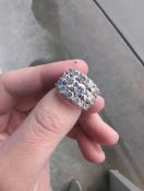 14 karat white gold three-row diamond band with appraisal from OC Tanner