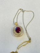 Ruby and diamond pendant 14 karat