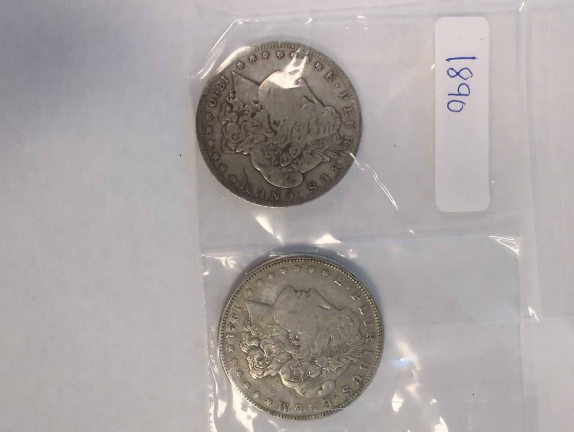 2 Morgan Dollars