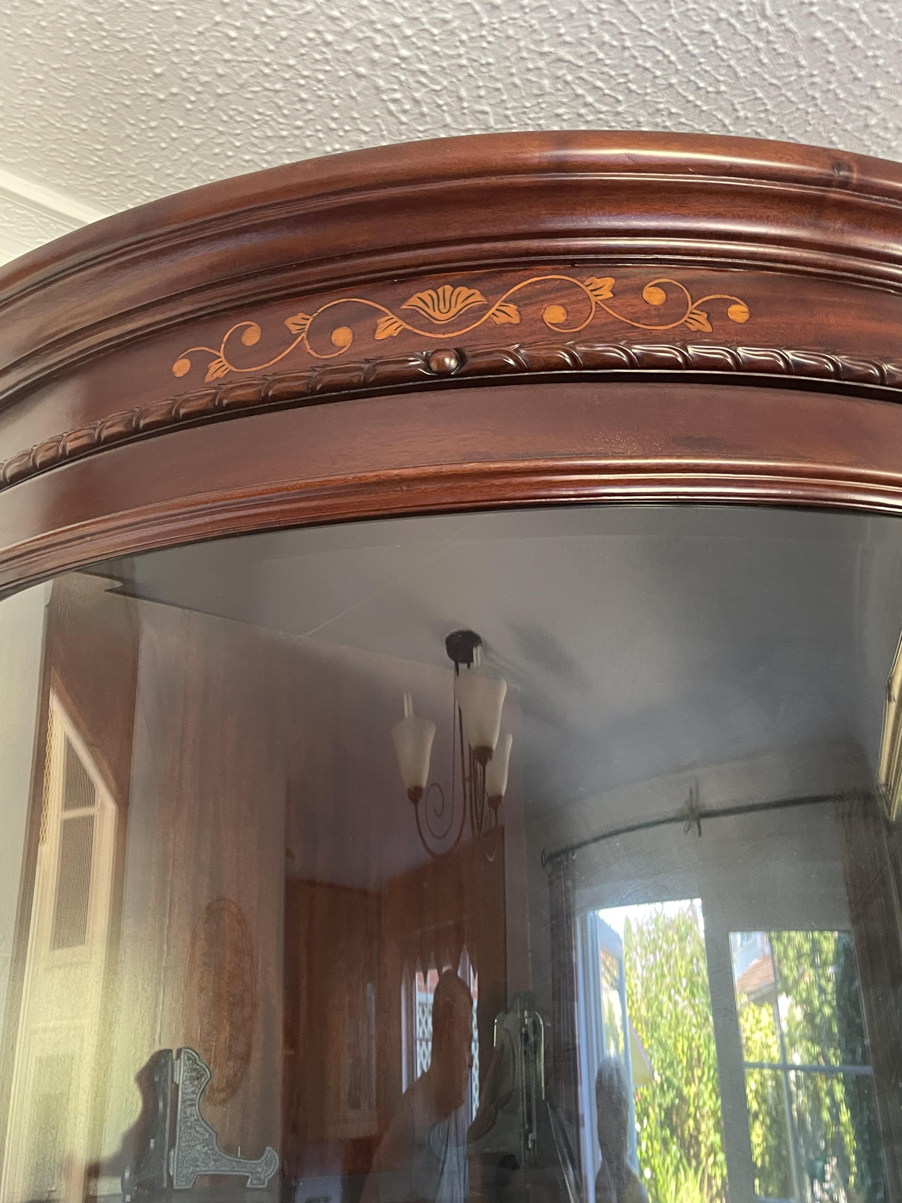 A mid to late 20th century mahogany bow fronted double corner cabinet. - Image 9 of 23