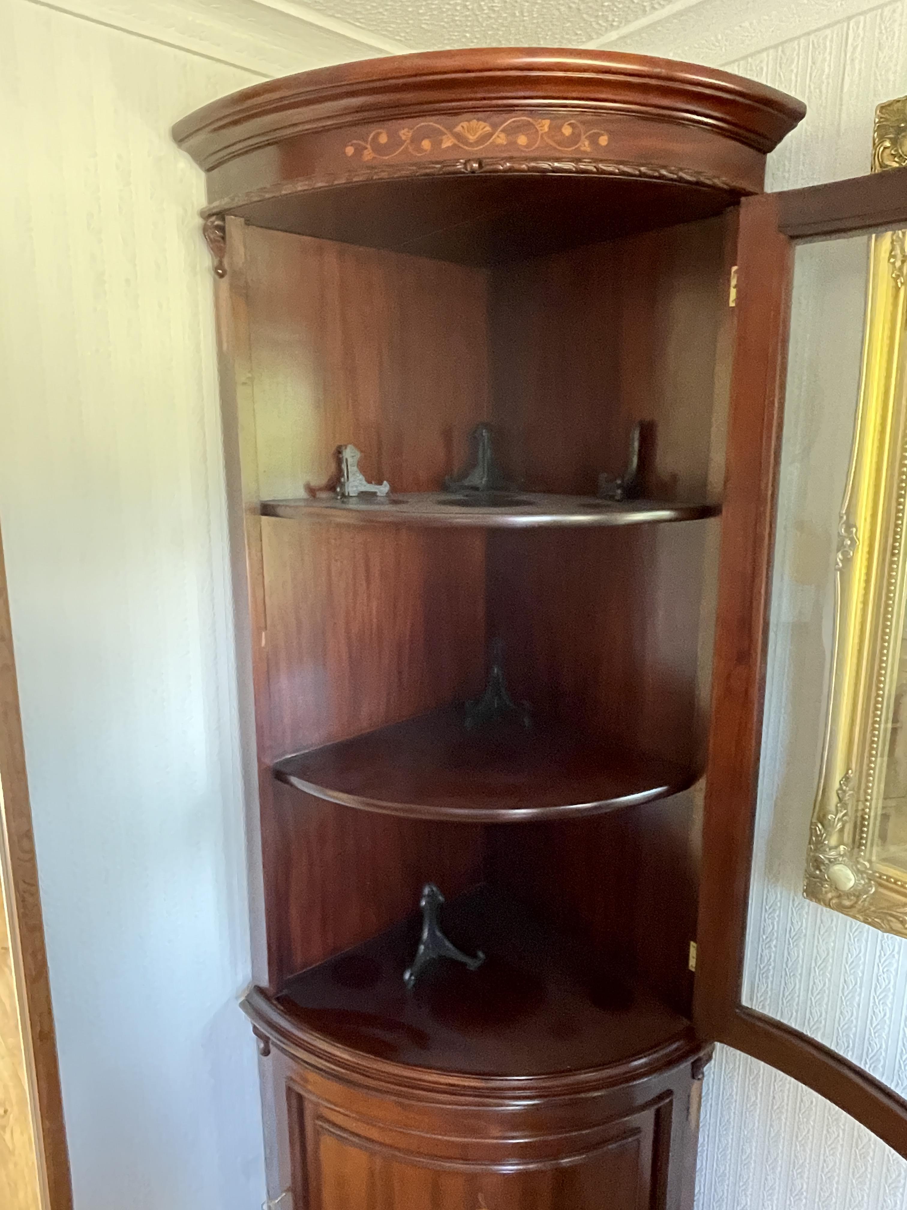 A mid to late 20th century mahogany bow fronted double corner cabinet. - Image 15 of 23