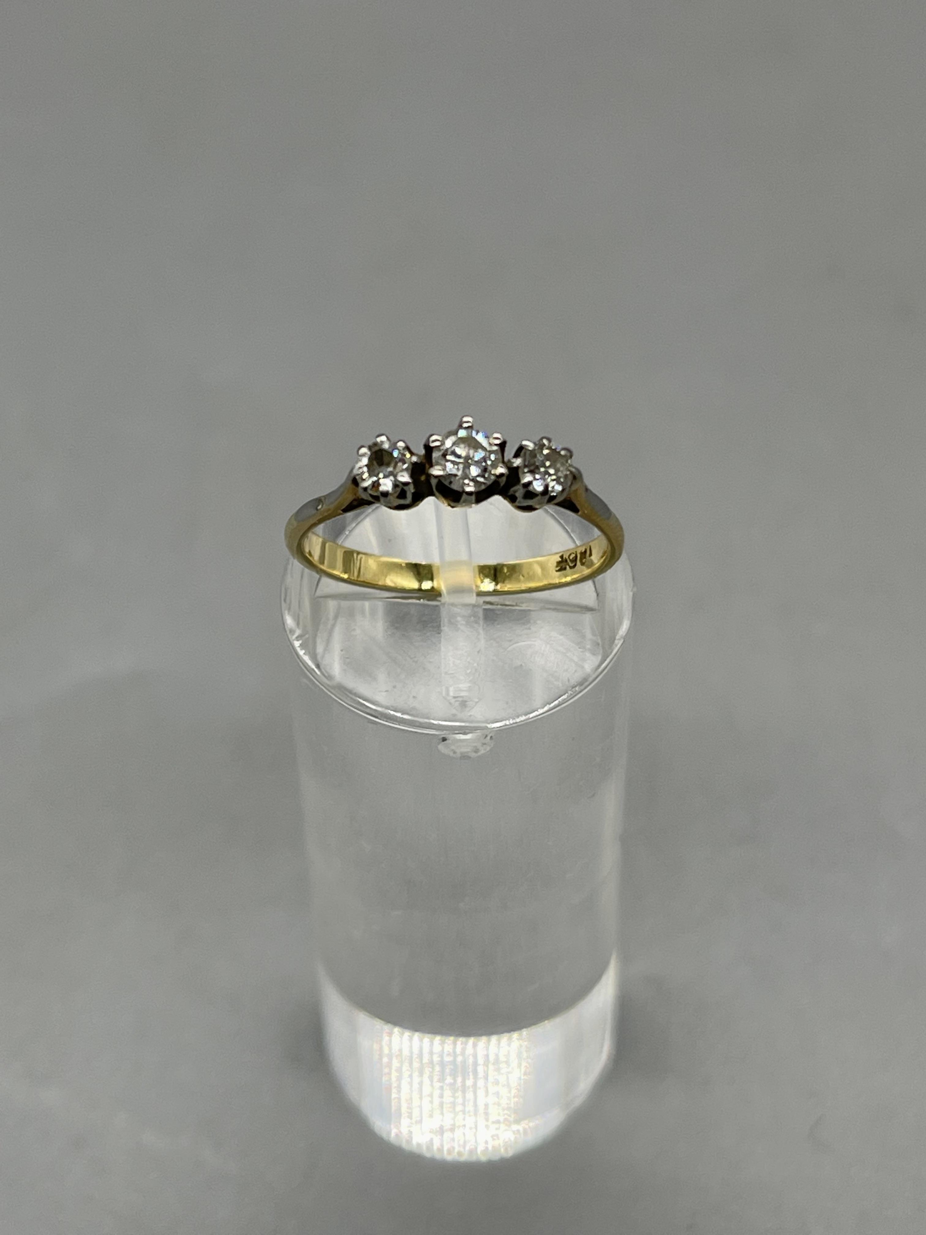 Three Stone Diamond Ring