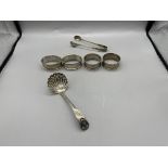 Four HM Silver Napkin Rings and HM Silver Spoon Su