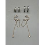 Two Pairs of Silver Hoop Earrings and One Pair of