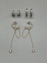 Two Pairs of Silver Hoop Earrings and One Pair of