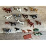 Quantity of plastic horse figures