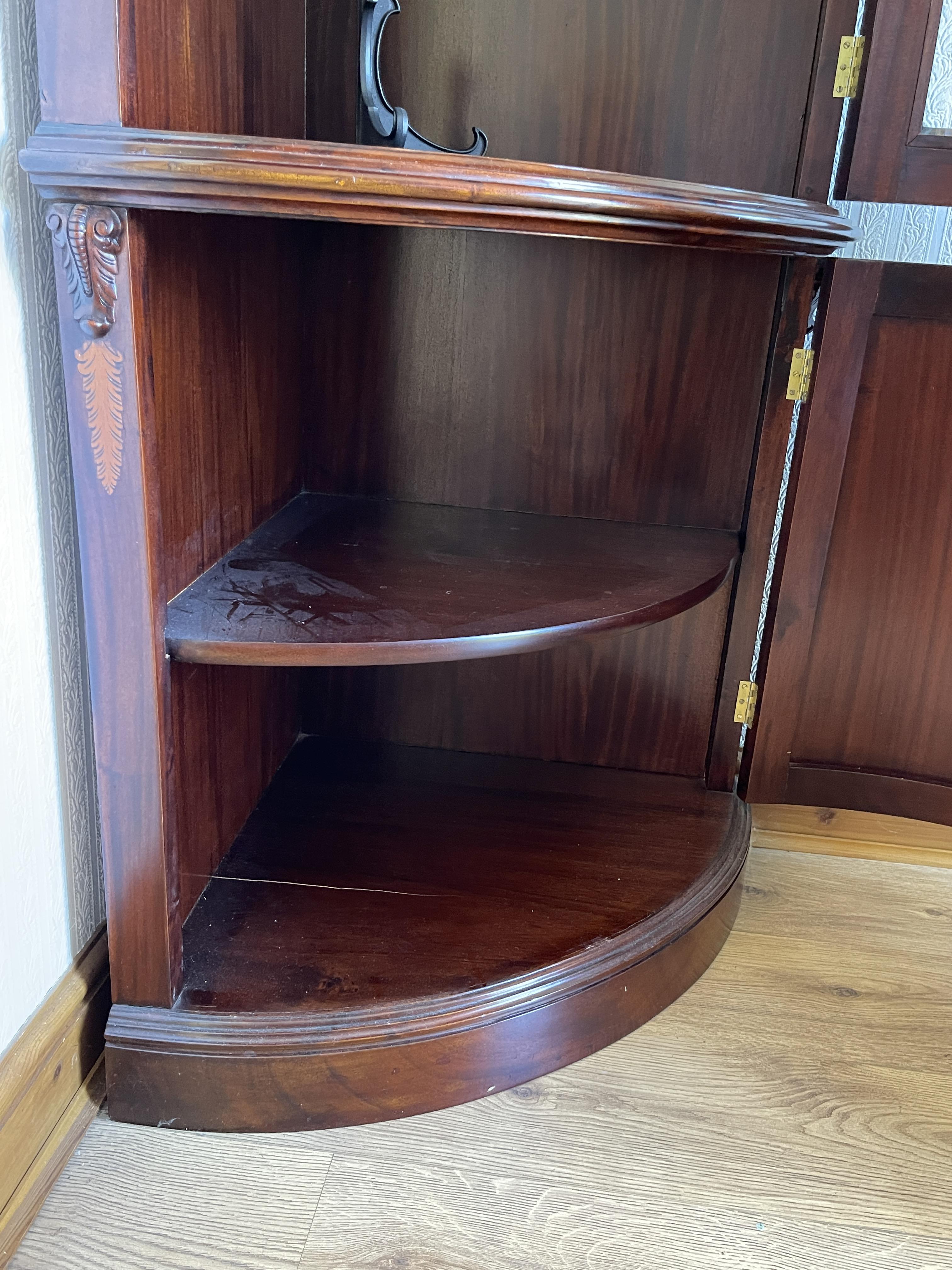 A mid to late 20th century mahogany bow fronted double corner cabinet. - Image 19 of 23