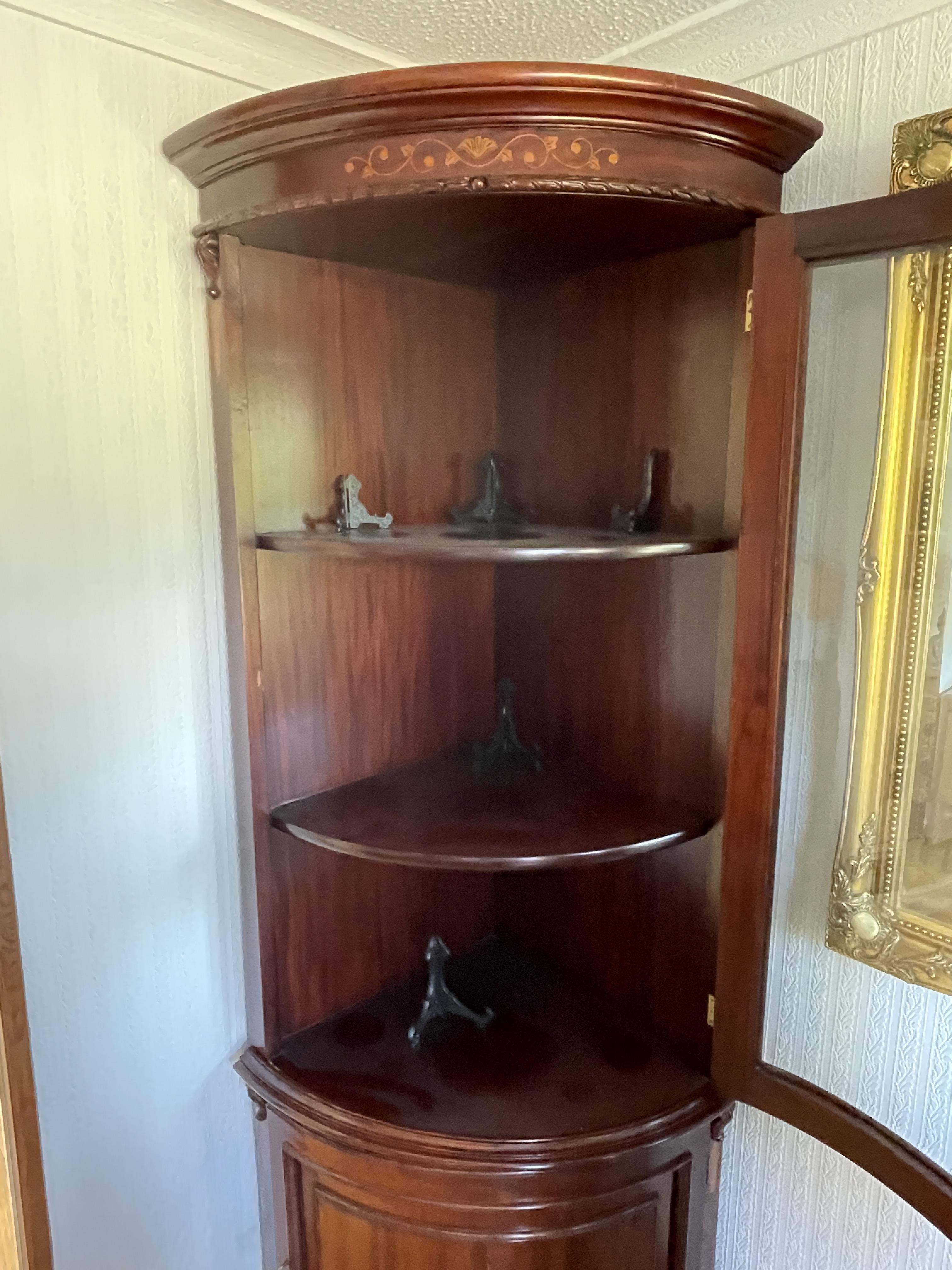 A mid to late 20th century mahogany bow fronted double corner cabinet. - Image 16 of 23