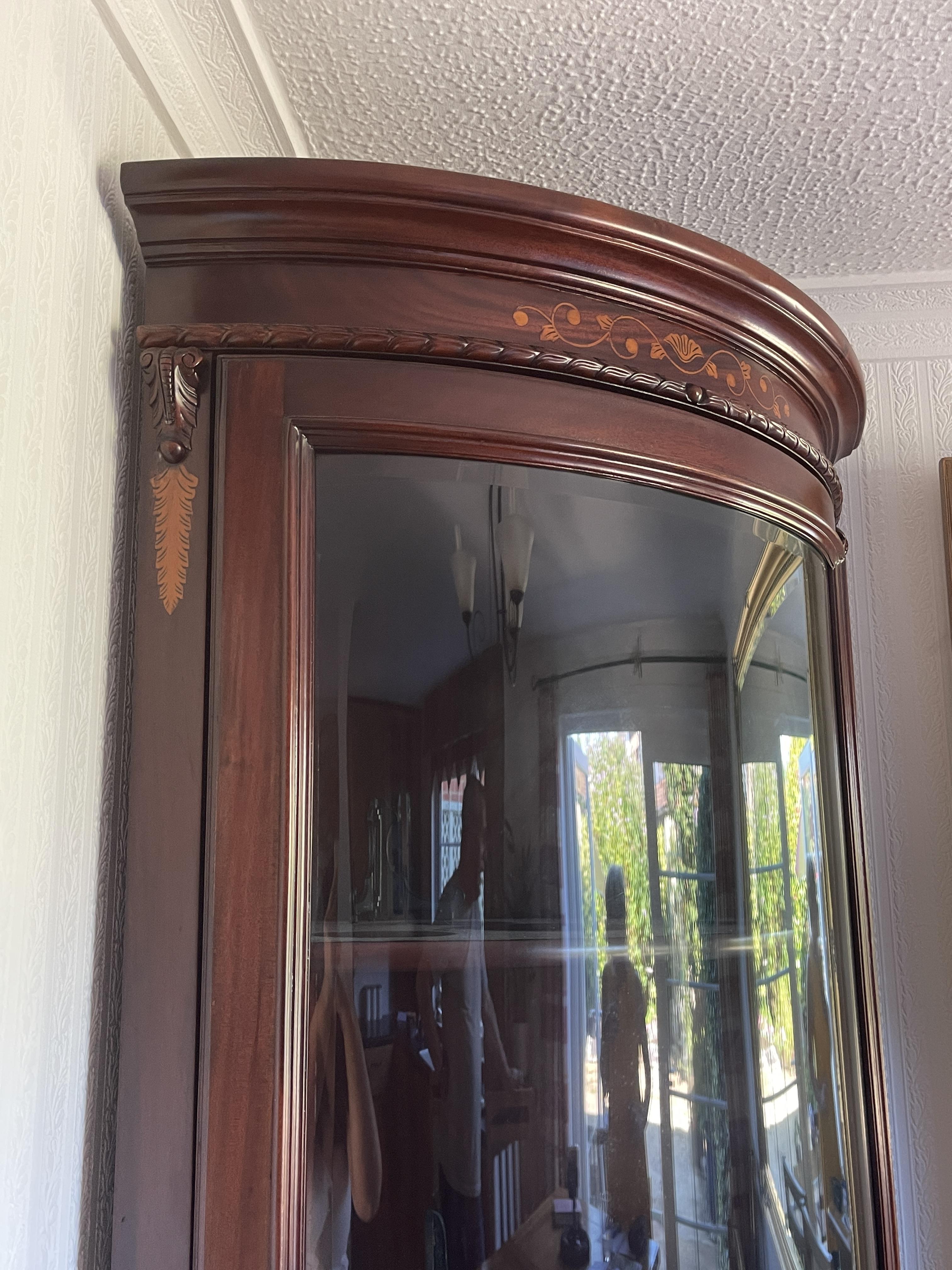 A mid to late 20th century mahogany bow fronted double corner cabinet. - Image 8 of 23