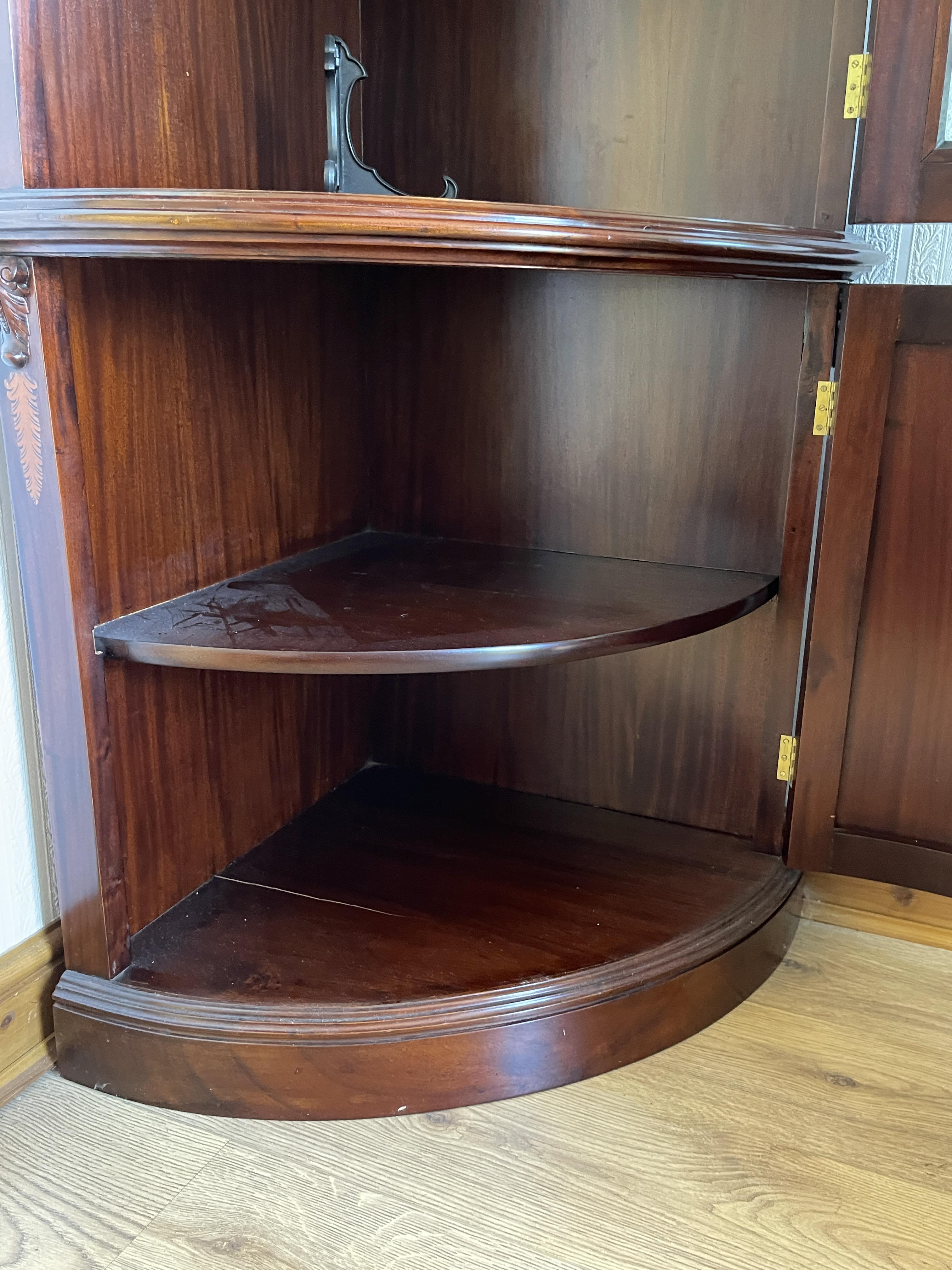 A mid to late 20th century mahogany bow fronted double corner cabinet. - Image 20 of 23