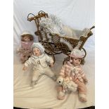 Collection of three vintage porcelain dolls along
