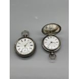 Two vintage solid silver fob watches. Glass missin
