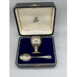 Boxed HM Silver Egg Cup and Spoon. Total weight 4