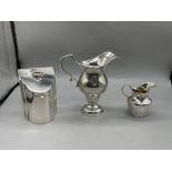 HM Silver Tea Caddy, and Two HM Silver Jugs. Tota