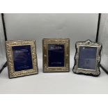 Three HM Silver Picture Frames.