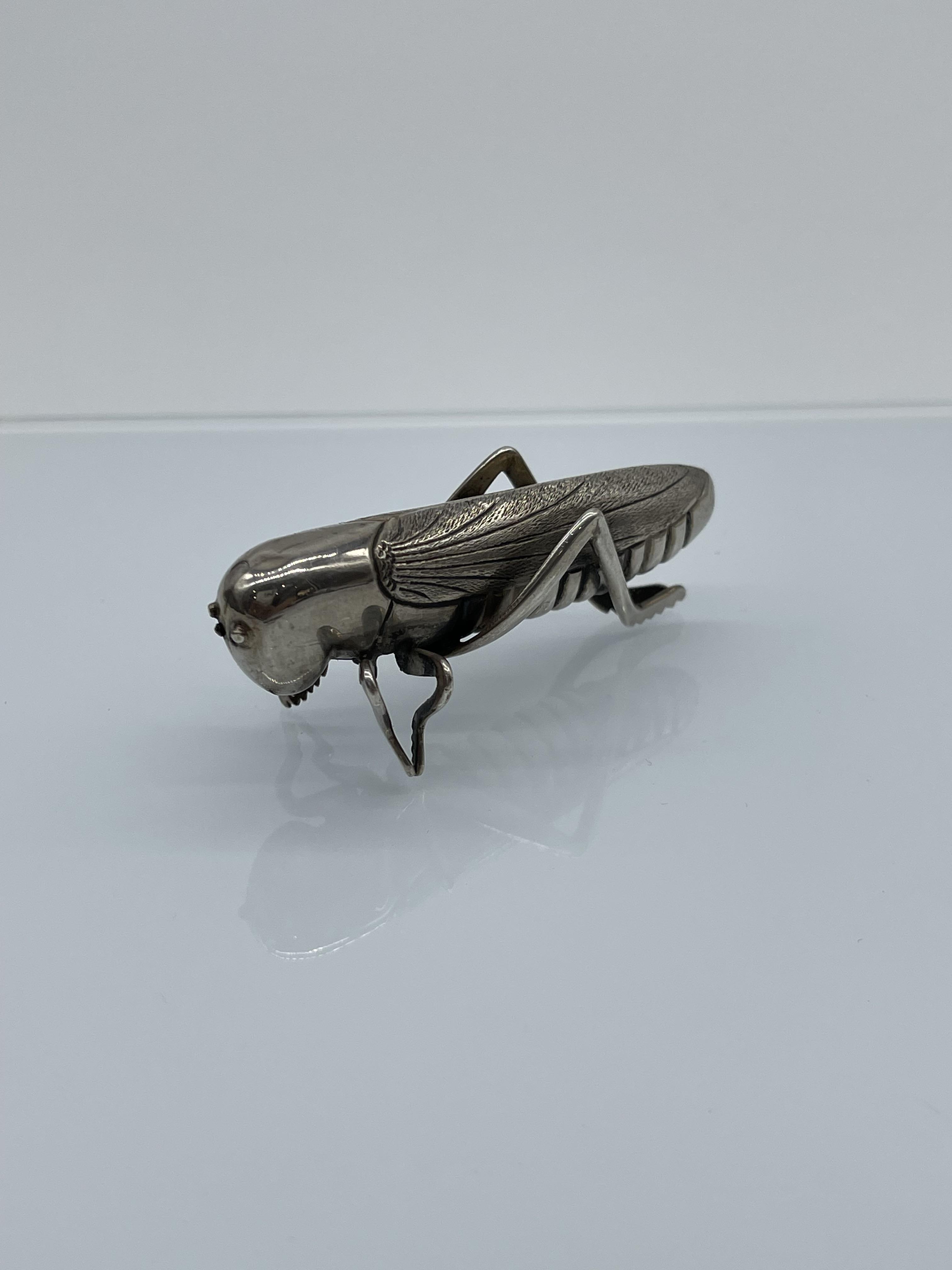 Silver Figure of Locust, unhallmarked.