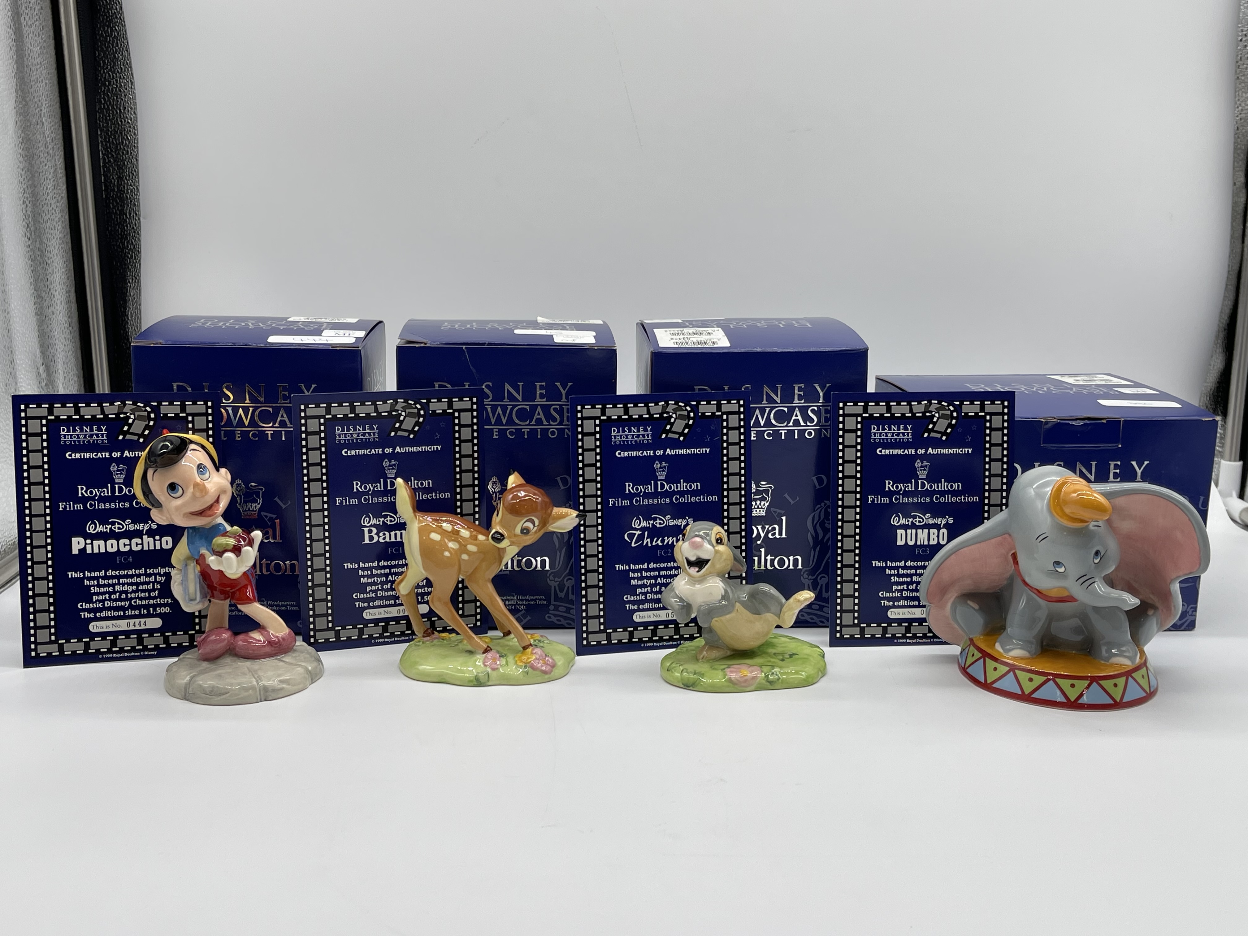 Four Boxed Royal Doulton - Walt Disney - Disney Sh