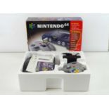 Nintendo 64 console - released in 1996 - in original box, appears complete (1 in lot)