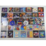Philips CD-i games and music including Cluedo The Mysteries Continue, The Cranberries Doors and