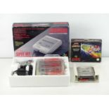 Super NES (Super Nintendo Entertainment System) Control Set (video games console) together with a