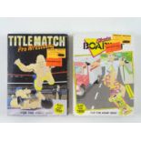 A pair of Atari 2600 / 7800 games including Titlematch Pro Wrestling and Skate Boardin' (2 in lot)