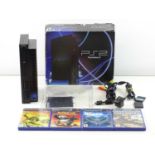 Playstation 2 - released in 2000 - SCPH-50003 - in original box with an additional 4 games,