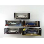 A group of 1:18 scale diecast cars by MAISTO and KYOSHO - VG in G boxes (5)