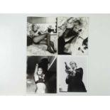 GET CARTER (1971) - A group of four original vintage black/white stills - one with Michael Caine and