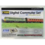 A GRAHAM FARISH N Gauge Digital Commuter Train Set comprising a Class 25 diesel loco, carriages,