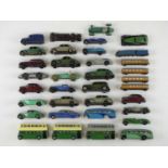 A quantity of playworn early DINKY cars, buses and a streamlined train, some for spares or