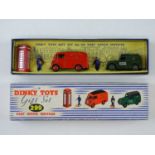 A DINKY TOYS Gift Set no. 299 'Post Office Services', appears complete - G/VG in G/VG box