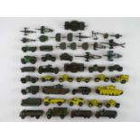 A quantity of playworn DINKY military vehicles, some repainted, some for spares or repair - F/G,