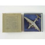 A DINKY Toys wartime 63 Mayo Composite Aircraft in silver with gliding hole, with some fatigue - F