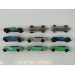 A group of playworn early DINKY cars including 38e Armstrong Siddeley Coupés and others - F/G (