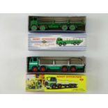A pair of DINKY Flat Trucks with chains comprising a 905 and a 935 both in reproduction boxes - F/