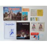 A selection of Disneyland memorabilia to include guide books and tickets