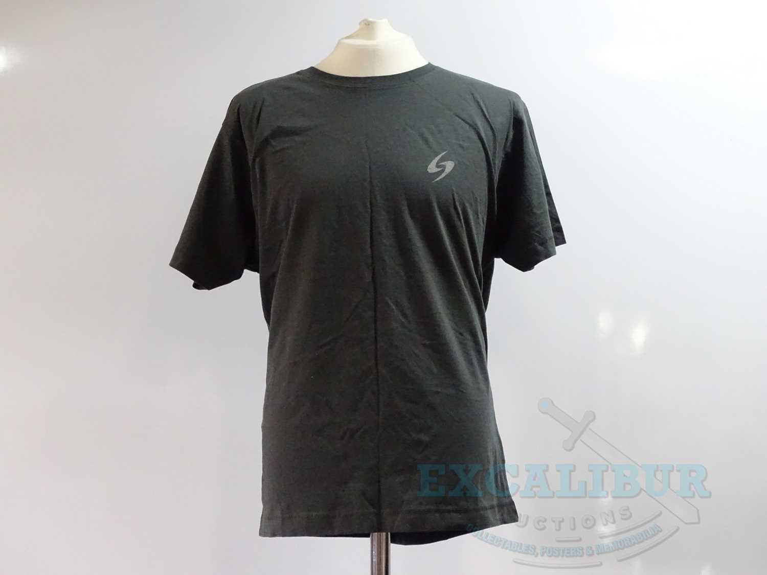 A group of three crew clothing items comprising MEN IN BLACK (1997) black short sleeved 'Neuralyze