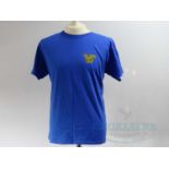 GULLIVER'S TRAVELS (2010) - A group of three crew clothing items comprising a blue short sleeved L